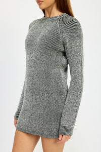 Gray knit sweater dress worn by a model on a white background